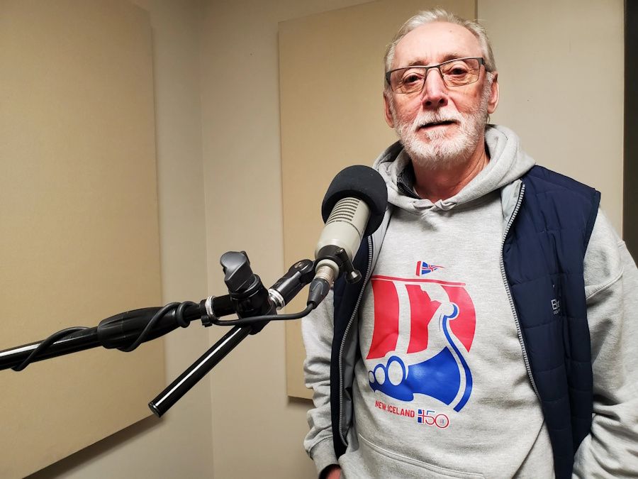 A man speaking into a microphone